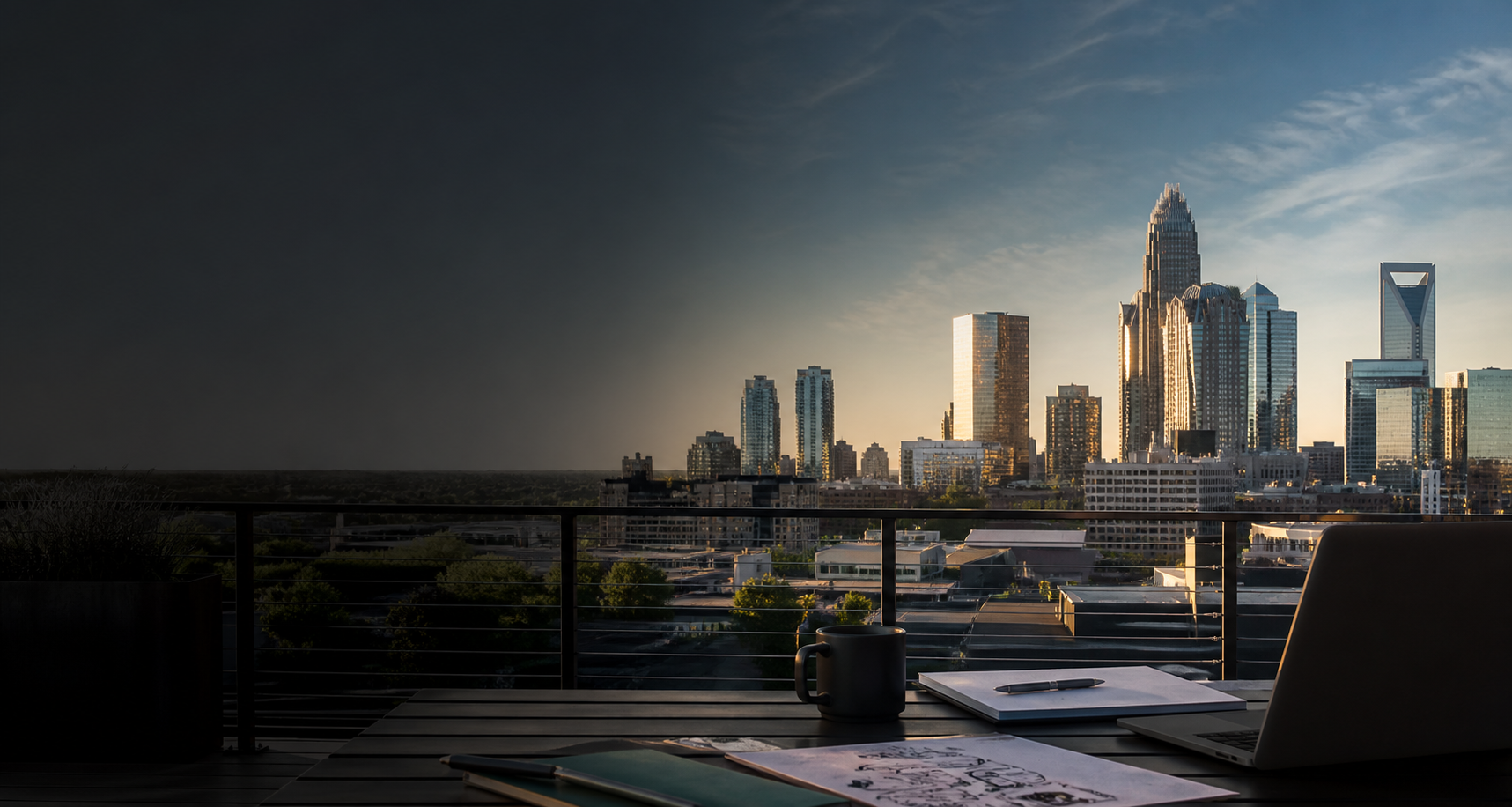 Charlotte skyline seen from a modern rooftop workspace